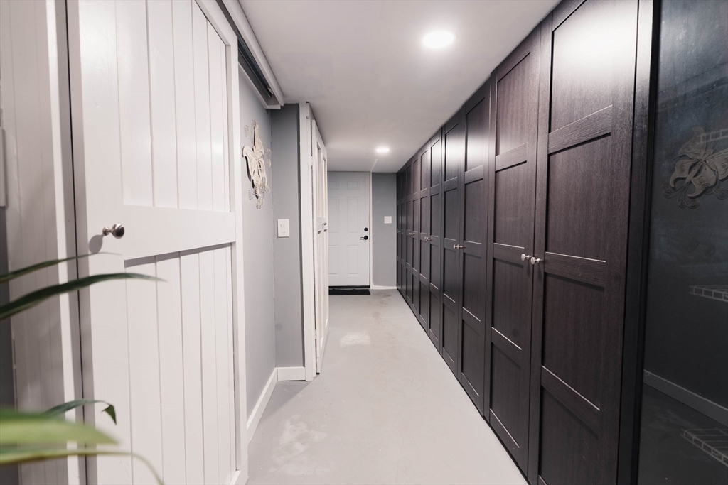 2 Kelsey Road Boxford, MA 01921 - Photo 27 of 42 a view of a hallway with wooden floor