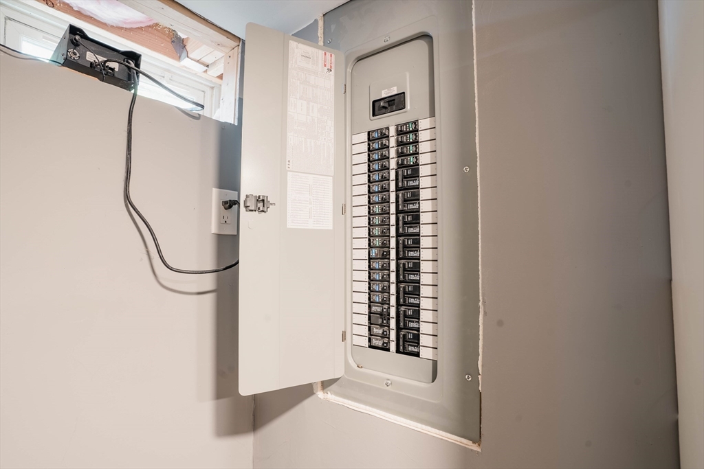 2 Kelsey Road Boxford, MA 01921 - Photo 36 of 42 a view of a room with rack on the wall and a window