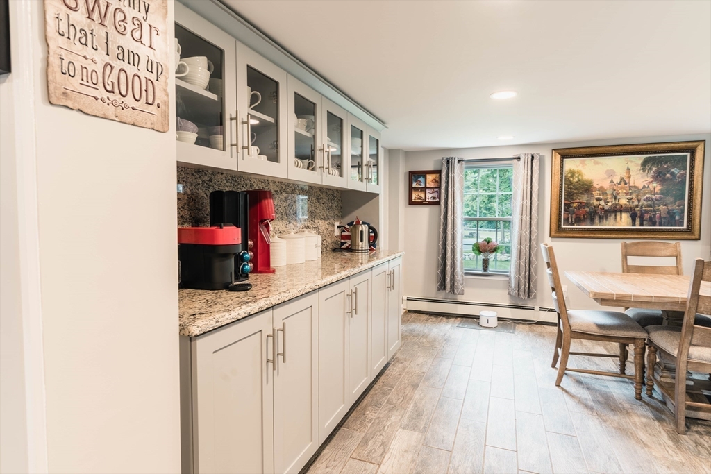 2 Kelsey Road Boxford, MA 01921 - Photo 8 of 42 a kitchen with stainless steel appliances granite countertop a sink and cabinets