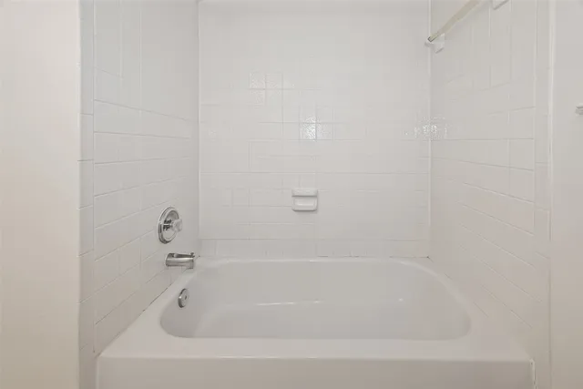 a close up of a bathtub