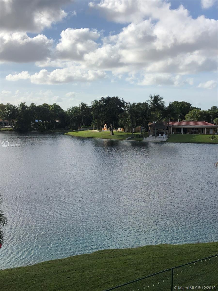 14640 Fitzpatrick Road Miami Lakes, FL 33014 - Photo 13 of 77 LAKE VIEW FROM NEIGHBORS 2ND FLOOR BALCONY.