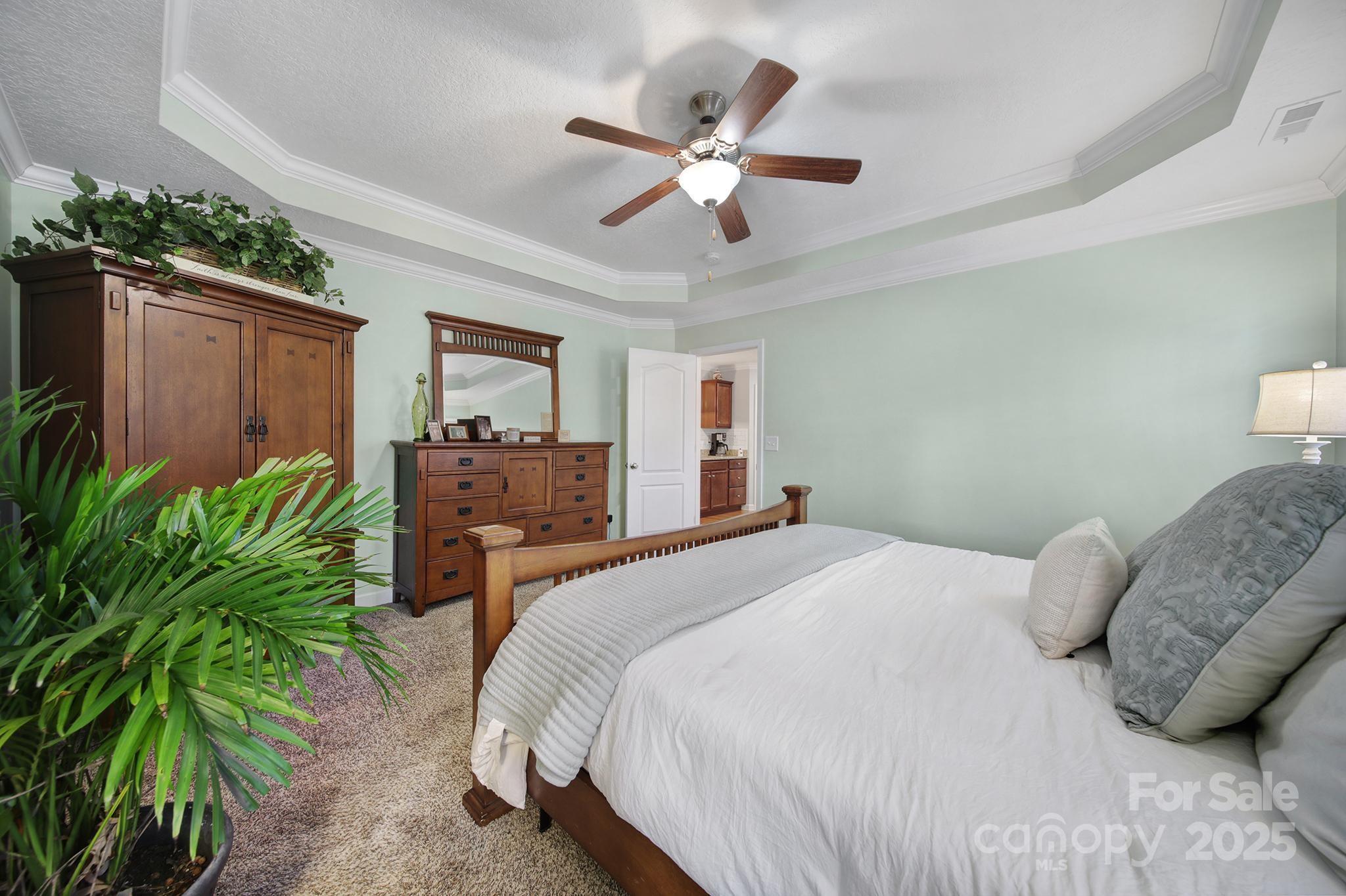 2045 Roadrunner Road Clover, SC 29710 - Photo 15 of 38 a bedroom with a bed and ceiling fan