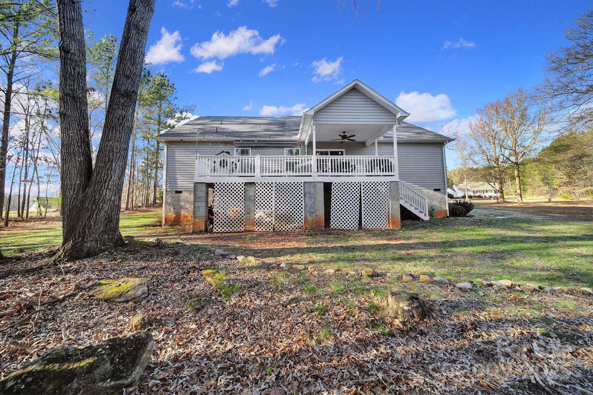 2045 Roadrunner Road Clover, SC 29710 - Photo 28 of 38 a view of a house with a yard