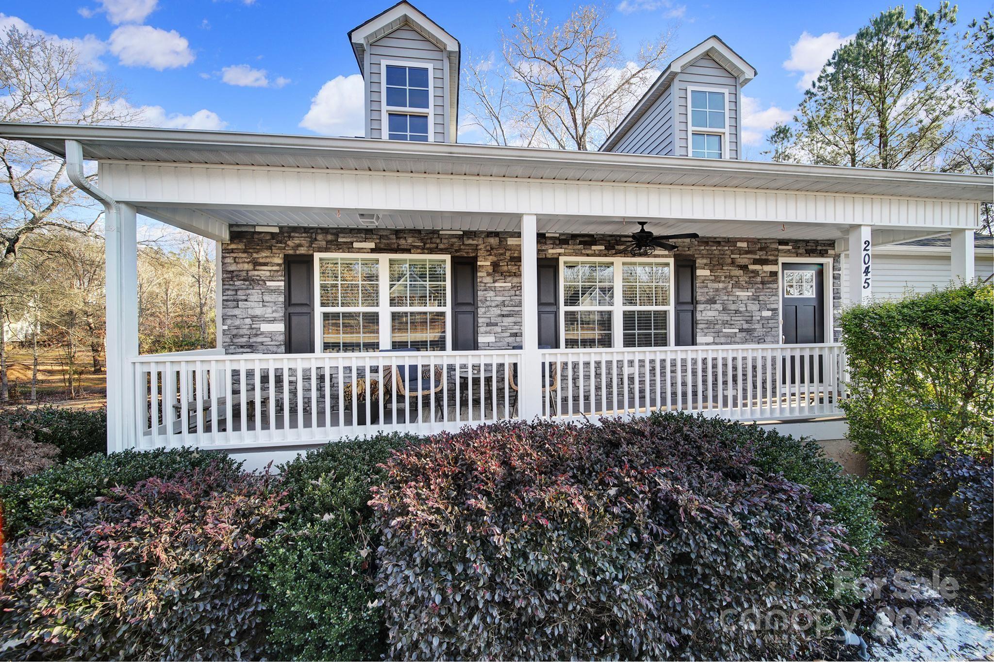 2045 Roadrunner Road Clover, SC 29710 - Photo 29 of 38 a view of a house with a garden