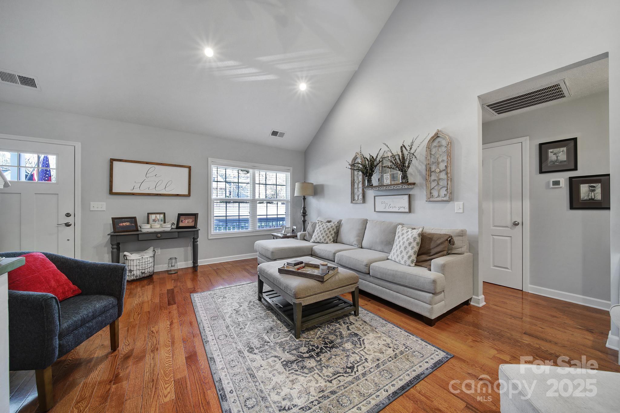 2045 Roadrunner Road Clover, SC 29710 - Photo 3 of 38 a living room with furniture and a wooden floor