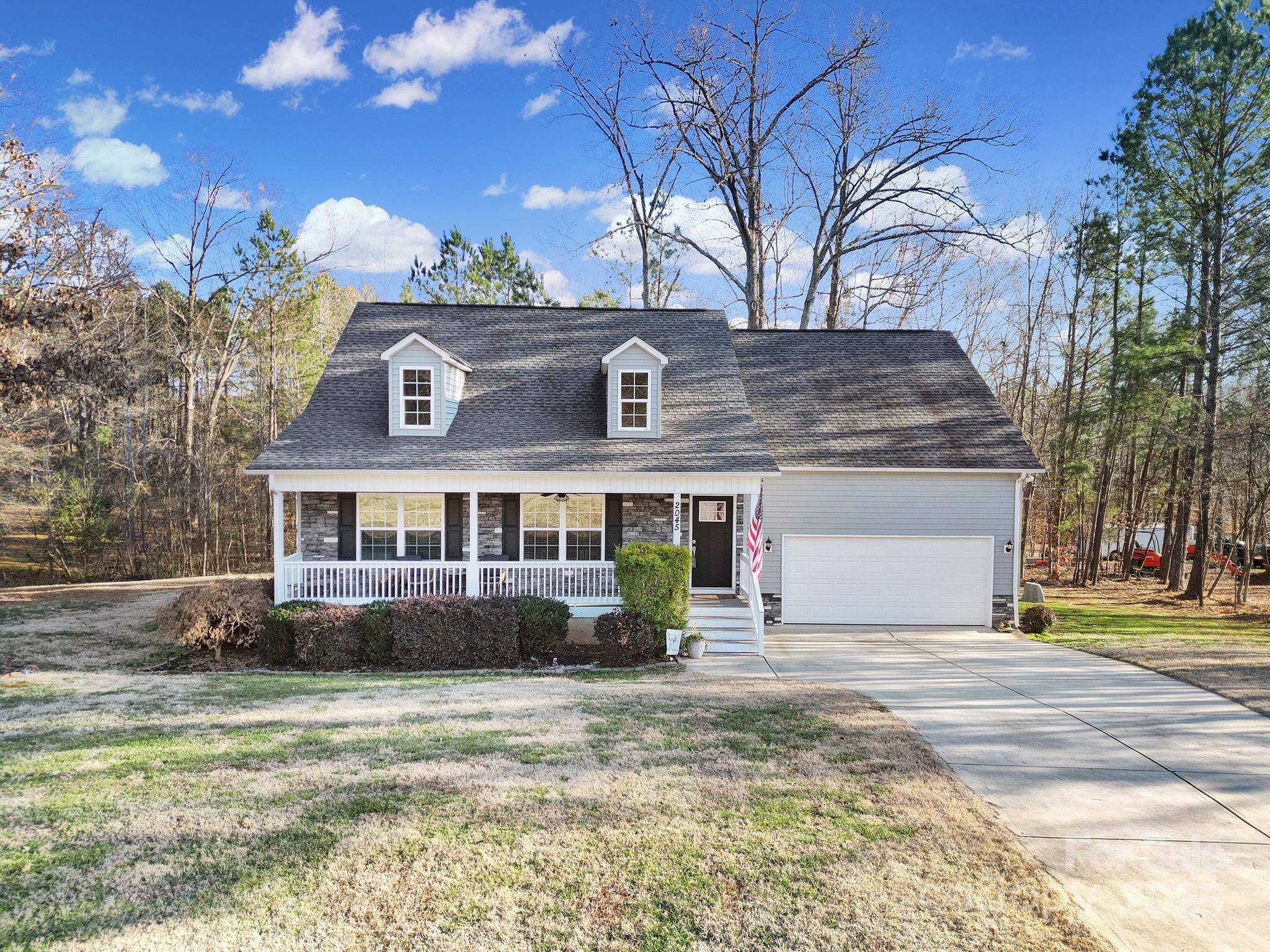 2045 Roadrunner Road Clover, SC 29710 - Photo 31 of 38 a front view of a house with a yard