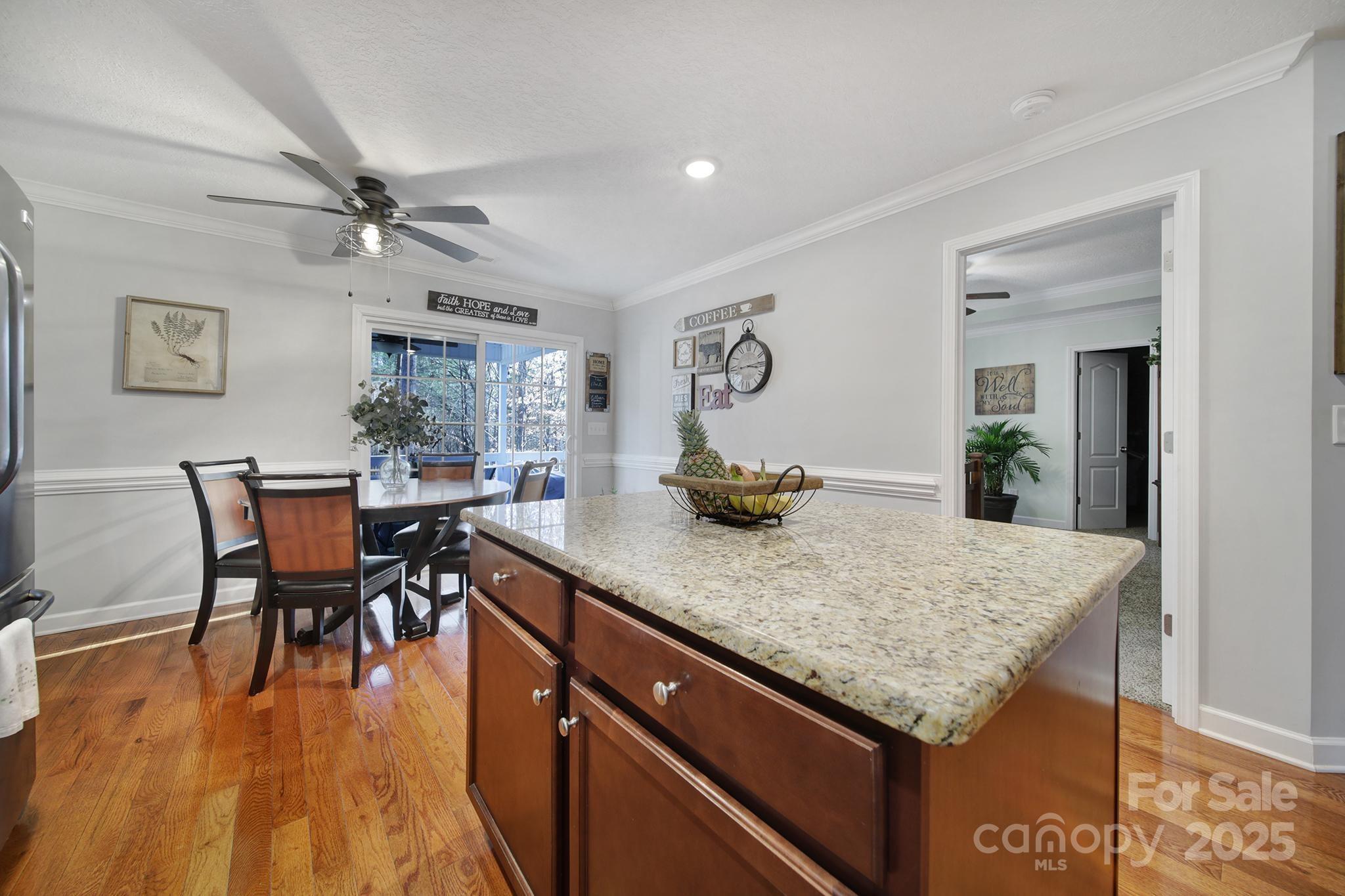 2045 Roadrunner Road Clover, SC 29710 - Photo 7 of 38 a kitchen with a table and chairs in it