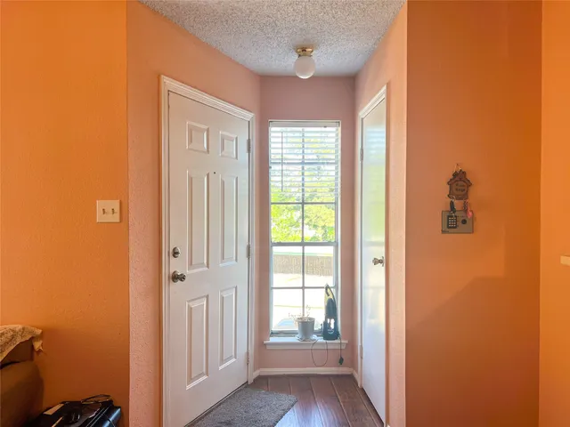 a view of a bathroom with a glass door