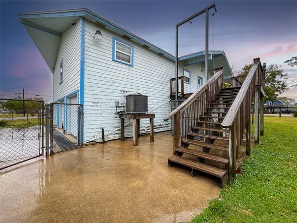 a view of balcony with wooden floor