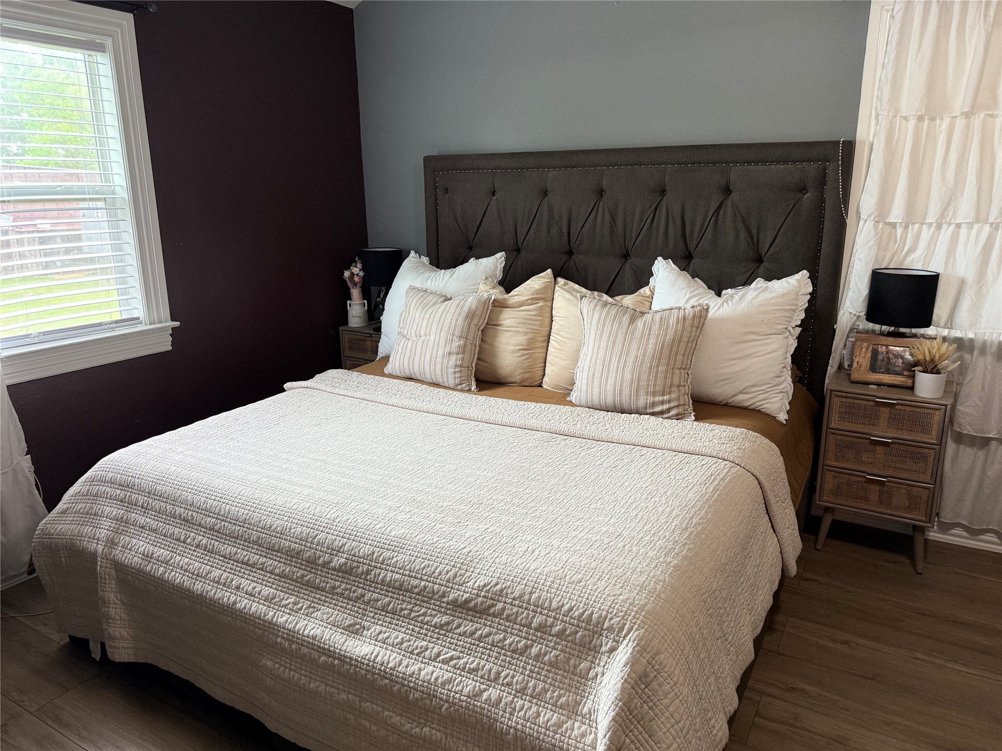 13125 1st Street Kendleton, TX 77417 - Photo 19 of 23 a large bed sitting in a bedroom next to a window
