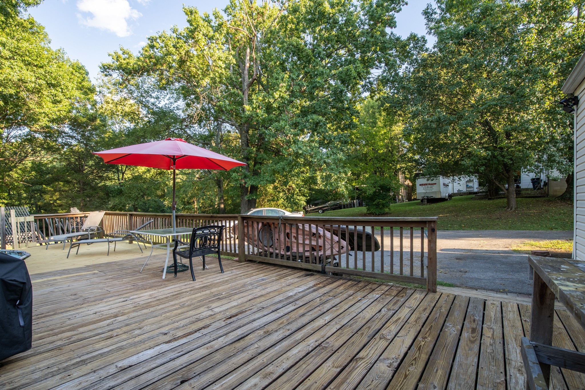 109 Randy Road Madison, TN 37115 - Photo 23 of 31 a view of balcony with outdoor seating and wooden floor