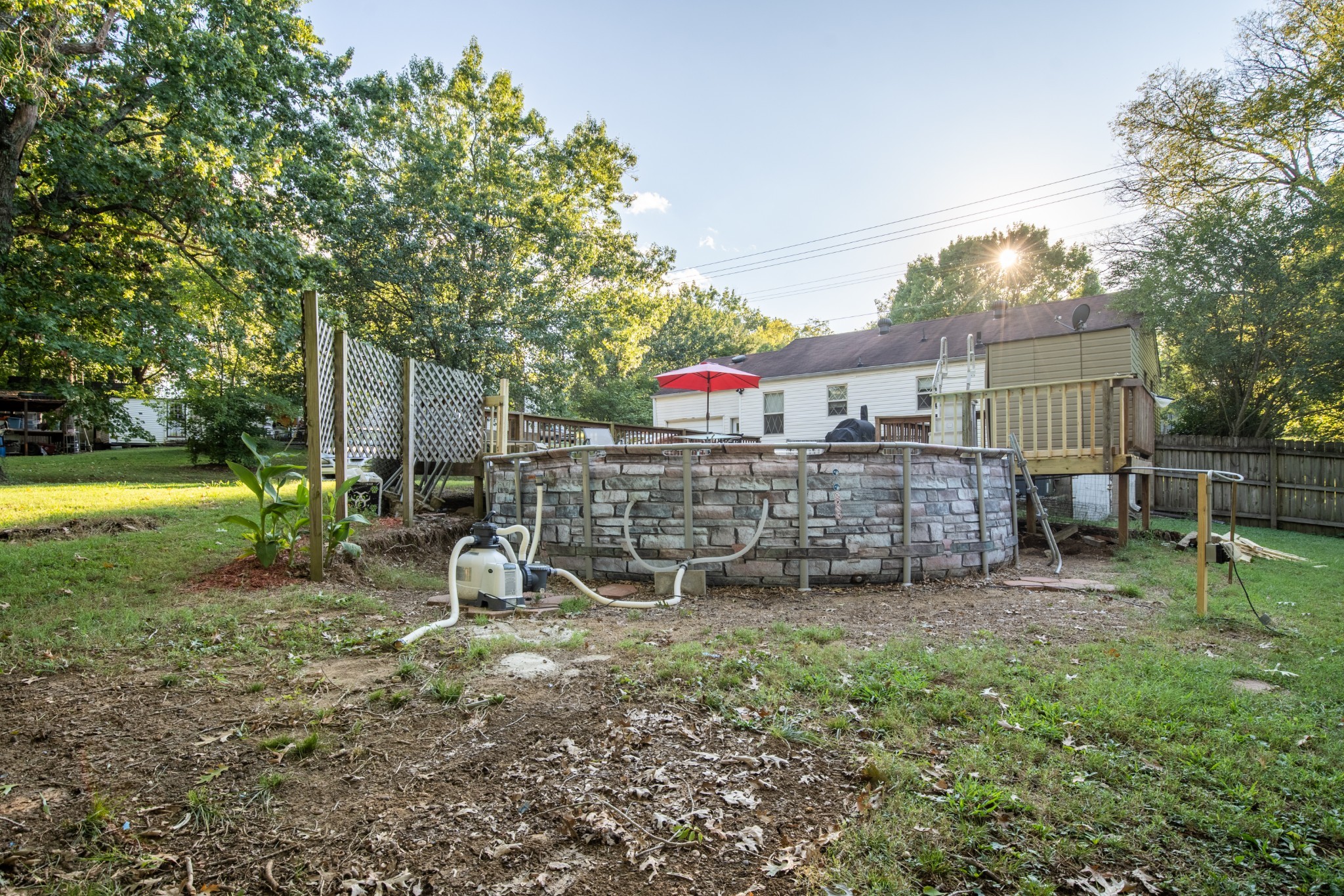 109 Randy Road Madison, TN 37115 - Photo 26 of 31 a view of a park with large trees and a small yard