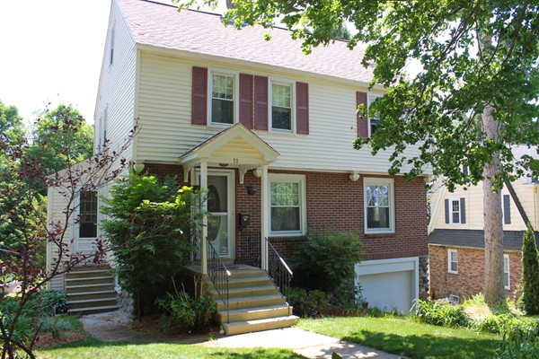 73 Morningside Road Worcester, MA 01602 - Photo 1 of 17 a front view of a house with a yard