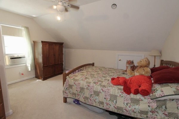 73 Morningside Road Worcester, MA 01602 - Photo 13 of 17 a bedroom with a bed and a cabinets
