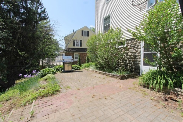 73 Morningside Road Worcester, MA 01602 - Photo 17 of 17 a view of a garden with plants and large trees