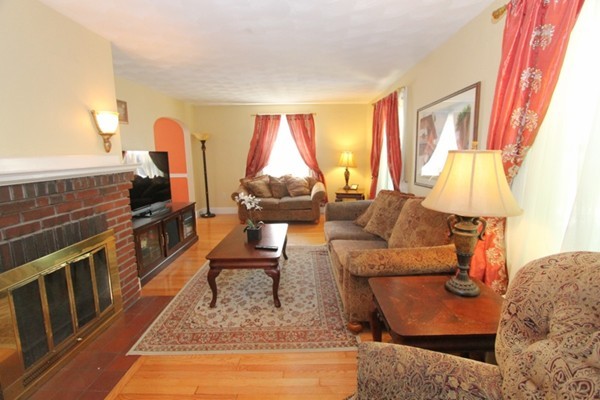 73 Morningside Road Worcester, MA 01602 - Photo 2 of 17 a living room with furniture and a flat screen tv
