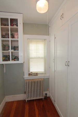 73 Morningside Road Worcester, MA 01602 - Photo 6 of 17 a view of an empty room with a window and wooden floor