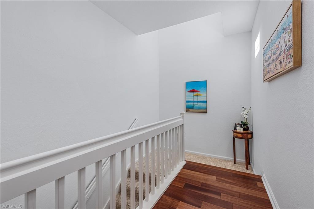 3945 Deer Crossing Court, Unit 203 Naples, FL 34114 - Photo 22 of 50 a view of hallway with stairs