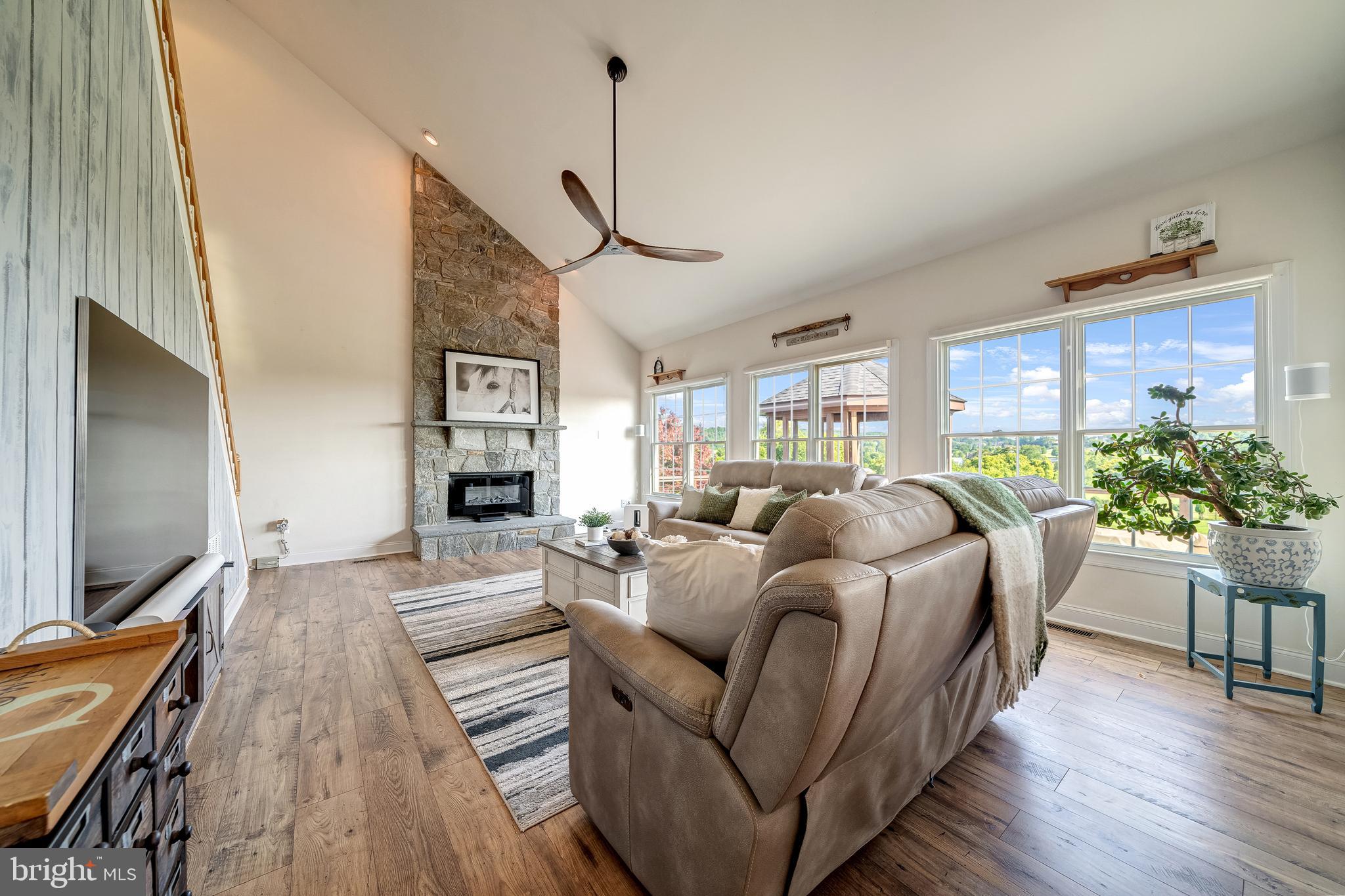 40965 Stumptown Road Waterford, VA 20197 - Photo 23 of 68 family room with 2 story stone fireplace