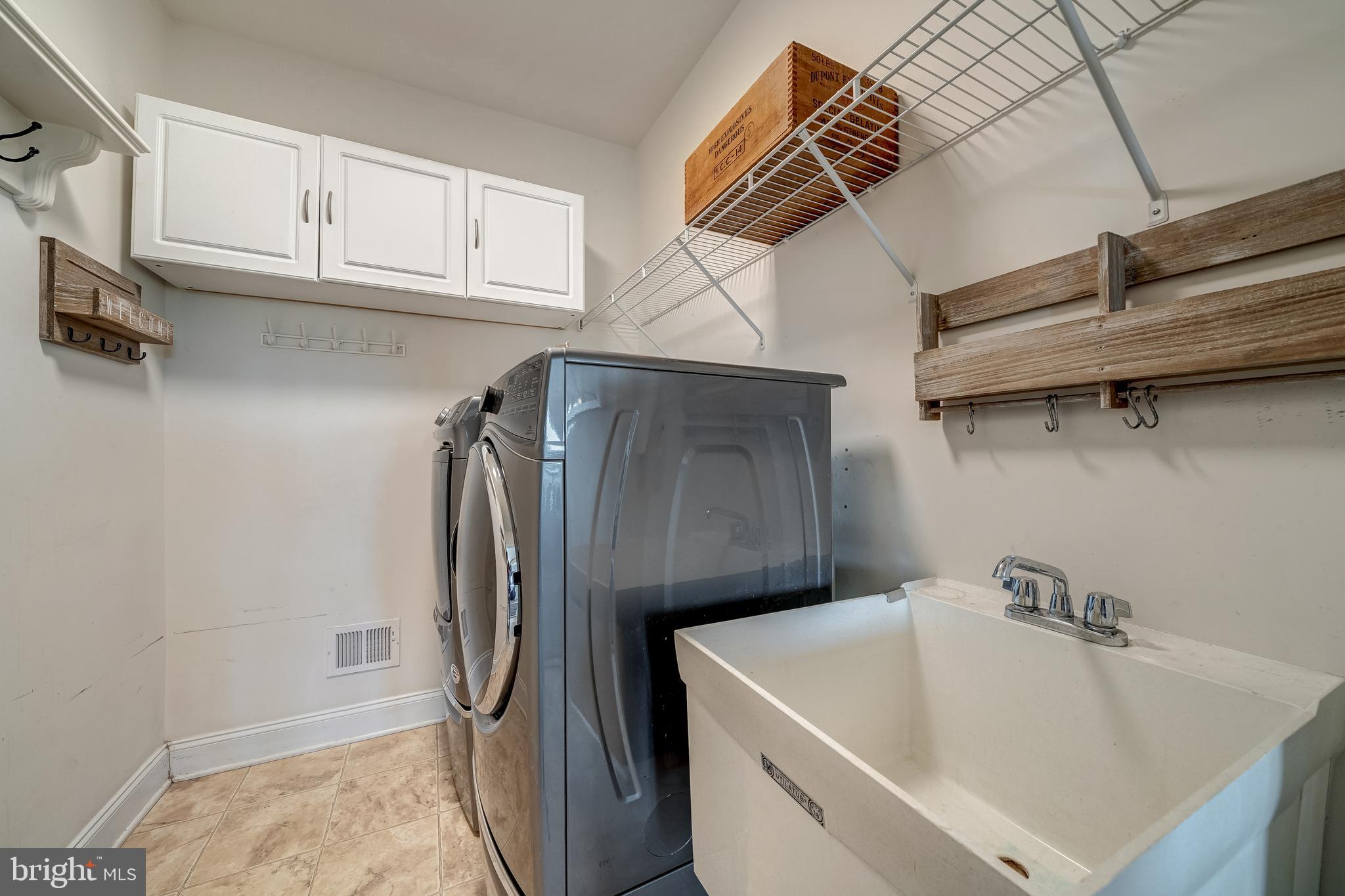 40965 Stumptown Road Waterford, VA 20197 - Photo 32 of 68 large laundry room with separate wash tub