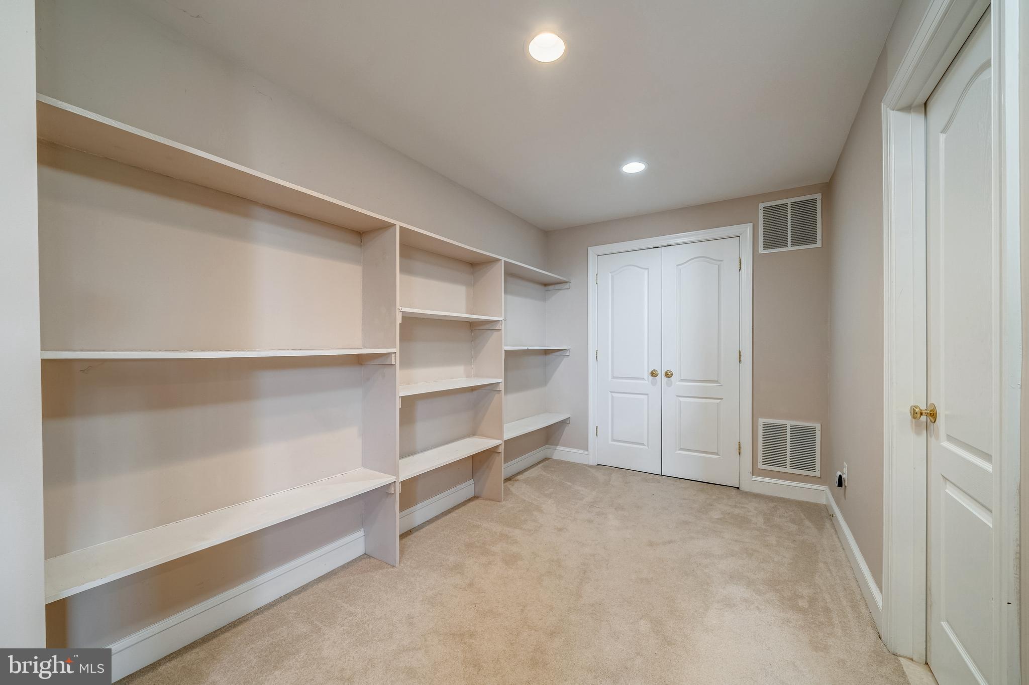 40965 Stumptown Road Waterford, VA 20197 - Photo 61 of 68 built in shelving in basement