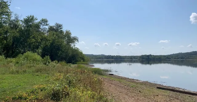 a view of a lake with a city