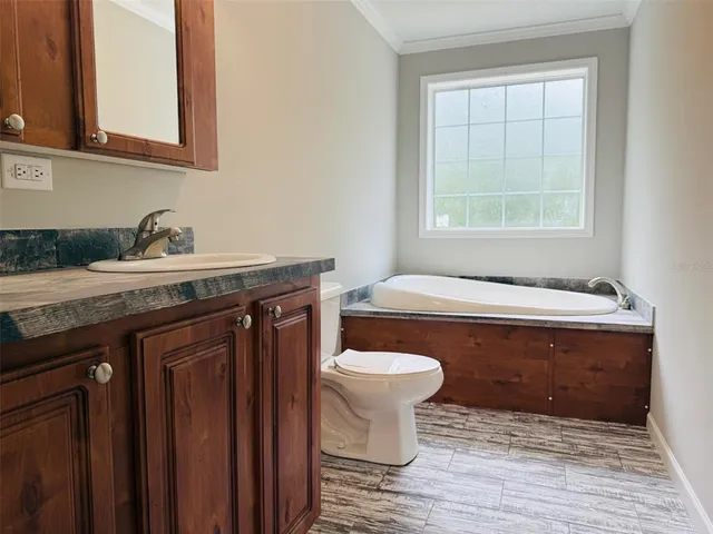 a bathroom with a sink and a toilet