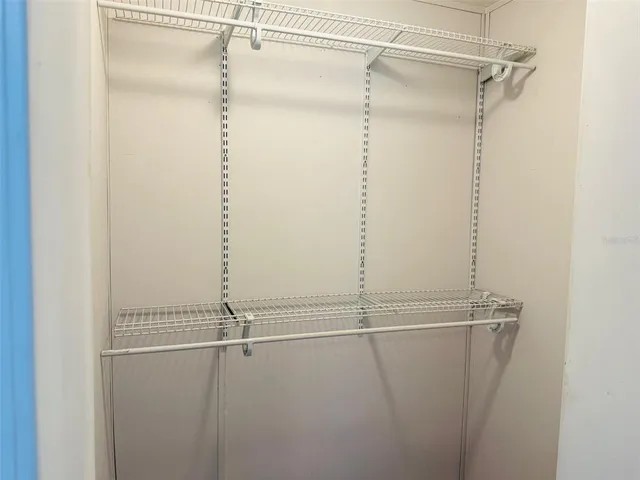 a view of a room with racks on the wall