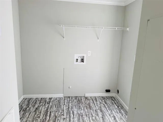 a view of a room with racks on the wall