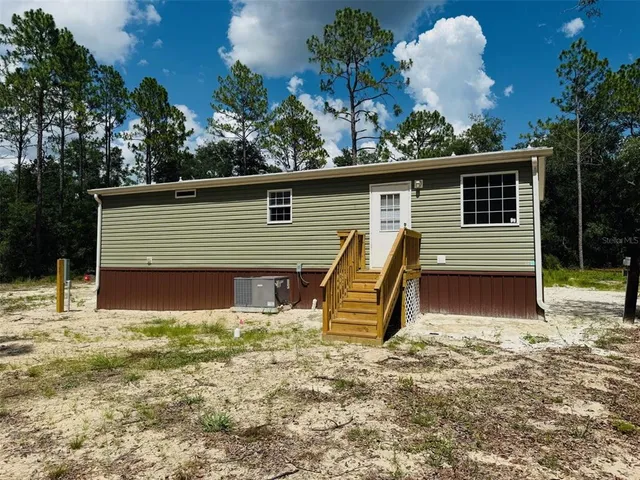 a front view of house with yard