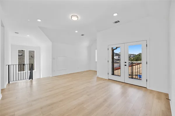 a view of entryway with wooden floor