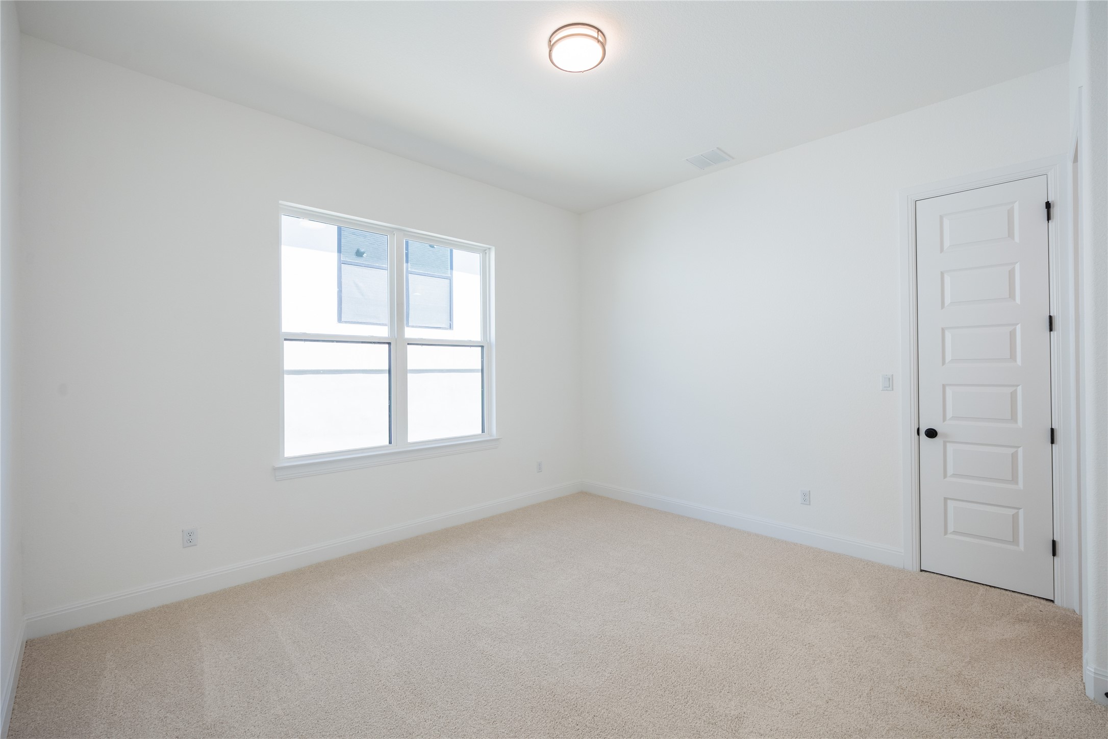 3213 Lookout Mountain Road Georgetown, TX 78628 - Photo 26 of 40 Spare room with light colored carpet and baseboards