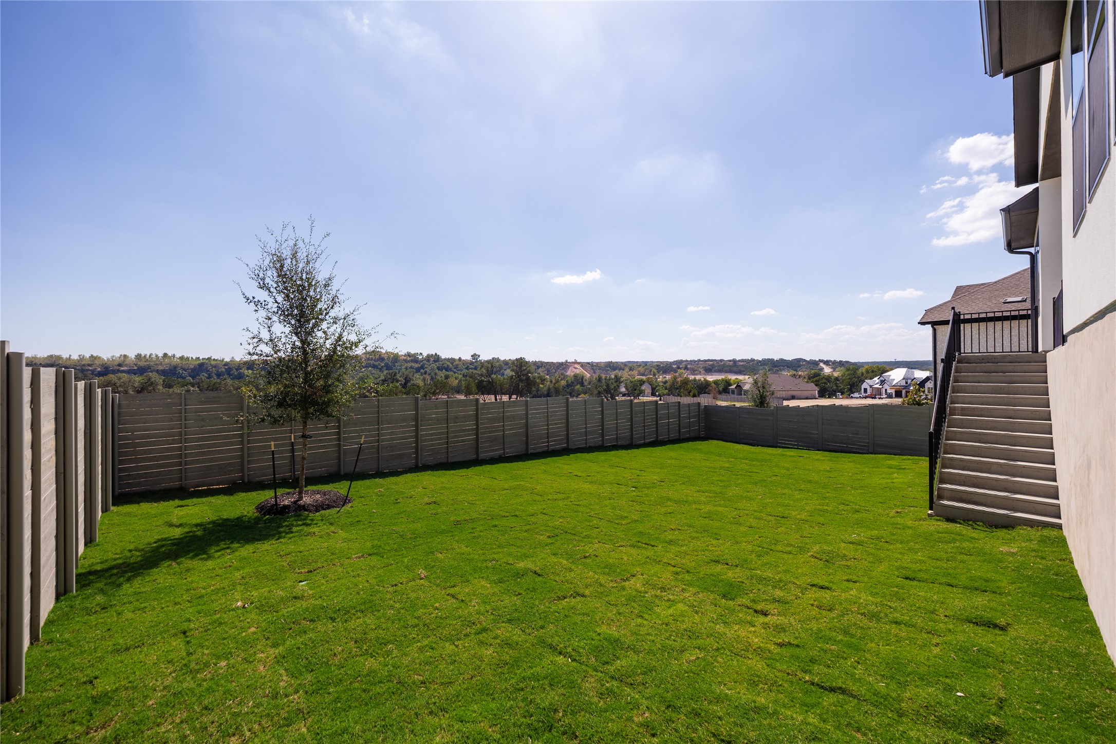 3213 Lookout Mountain Road Georgetown, TX 78628 - Photo 35 of 40 Fenced backyard featuring stairs