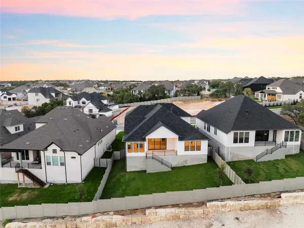 a view of a balcony with wooden floor