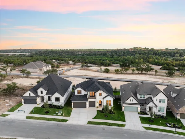 an aerial view of a house with a outdoor space