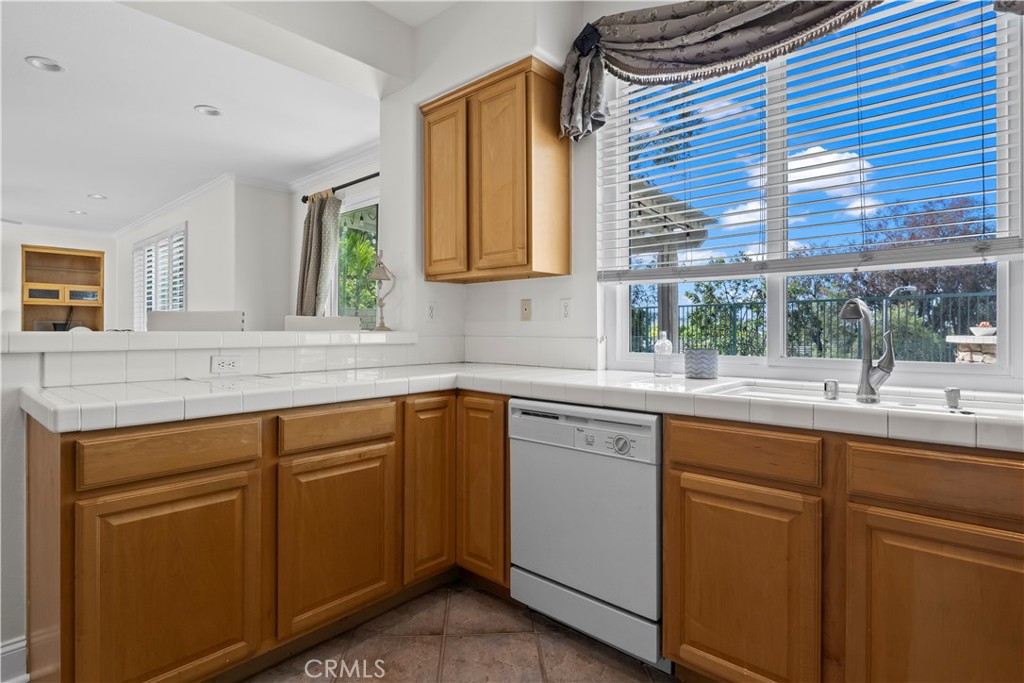 27 Rolling Ridge Rancho Santa Margarita, CA 92688 - Photo 14 of 42 a kitchen with sink and window