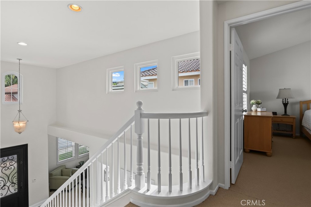 27 Rolling Ridge Rancho Santa Margarita, CA 92688 - Photo 17 of 42 a view of livingroom with furniture and stairs