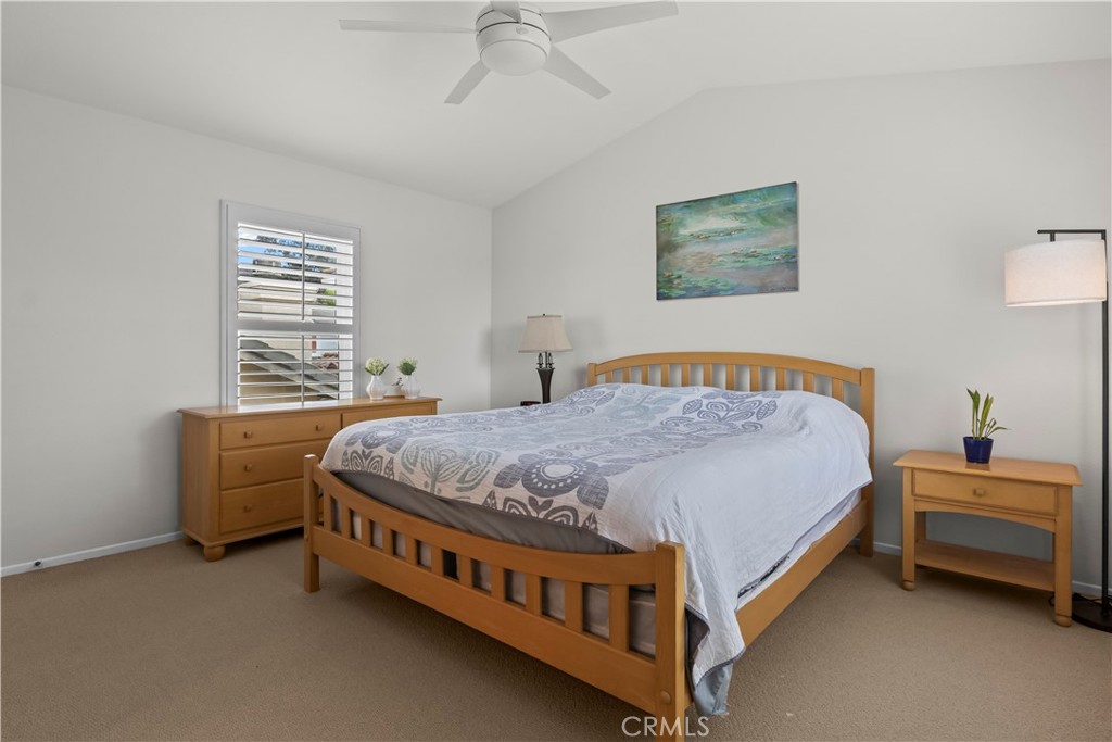 27 Rolling Ridge Rancho Santa Margarita, CA 92688 - Photo 20 of 42 a bed sitting in a bedroom next to a window