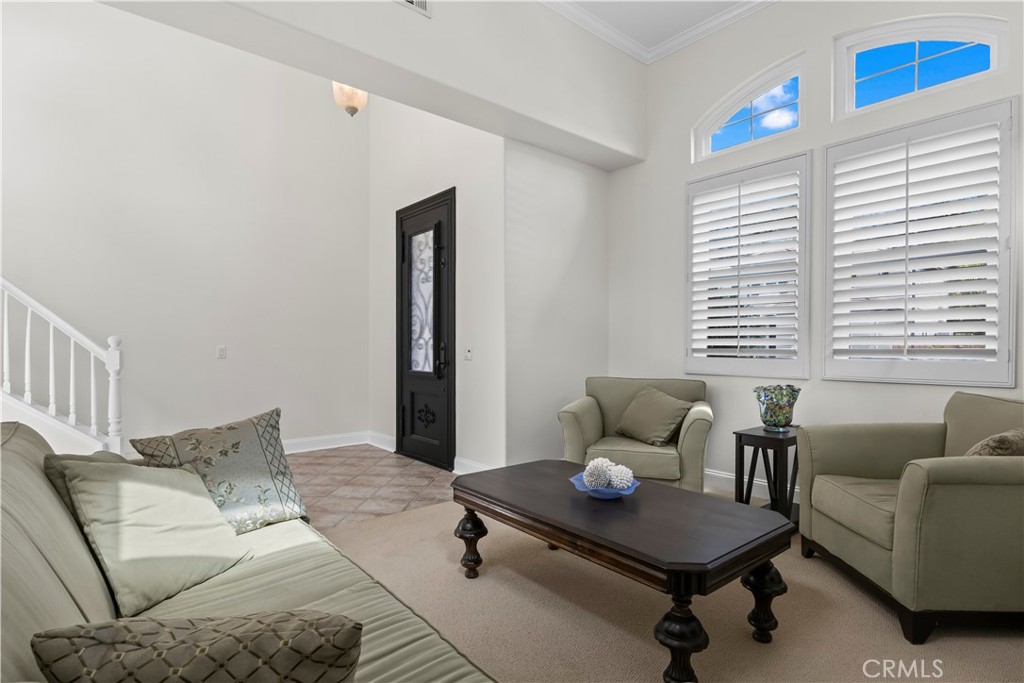 27 Rolling Ridge Rancho Santa Margarita, CA 92688 - Photo 4 of 42 a living room with furniture and window