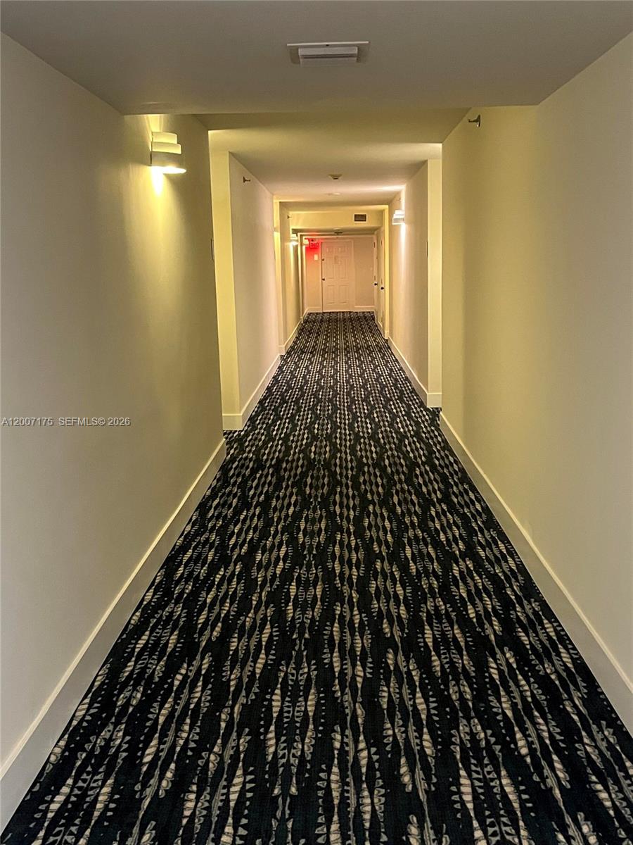 540 Brickell Key Drive, Unit 1809 Miami, FL 33131 - Photo 10 of 25 a view of a hallway