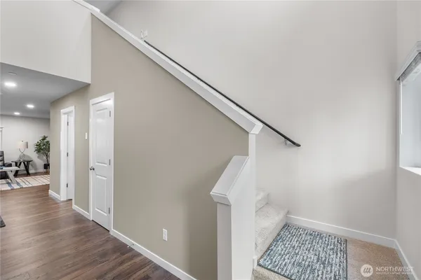 a view of entryway with wooden floor