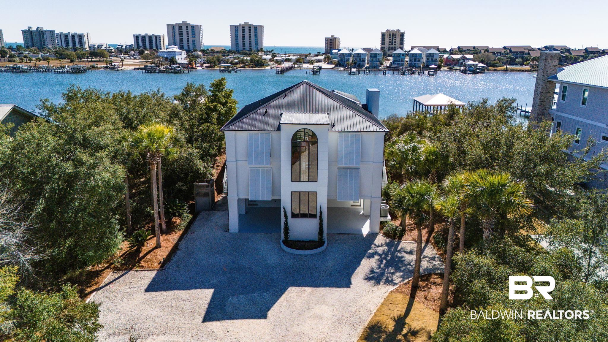 30194 River Road Orange Beach, AL 36561 - Photo 1 of 45 View of home featuring a water view and a view of city