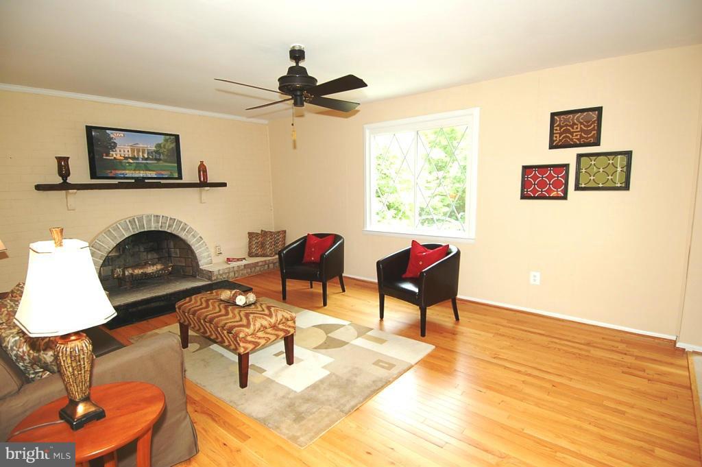 14113 Sturtevant Road Silver Spring, MD 20905 - Photo 14 of 30 Family Room with wood burning fireplace