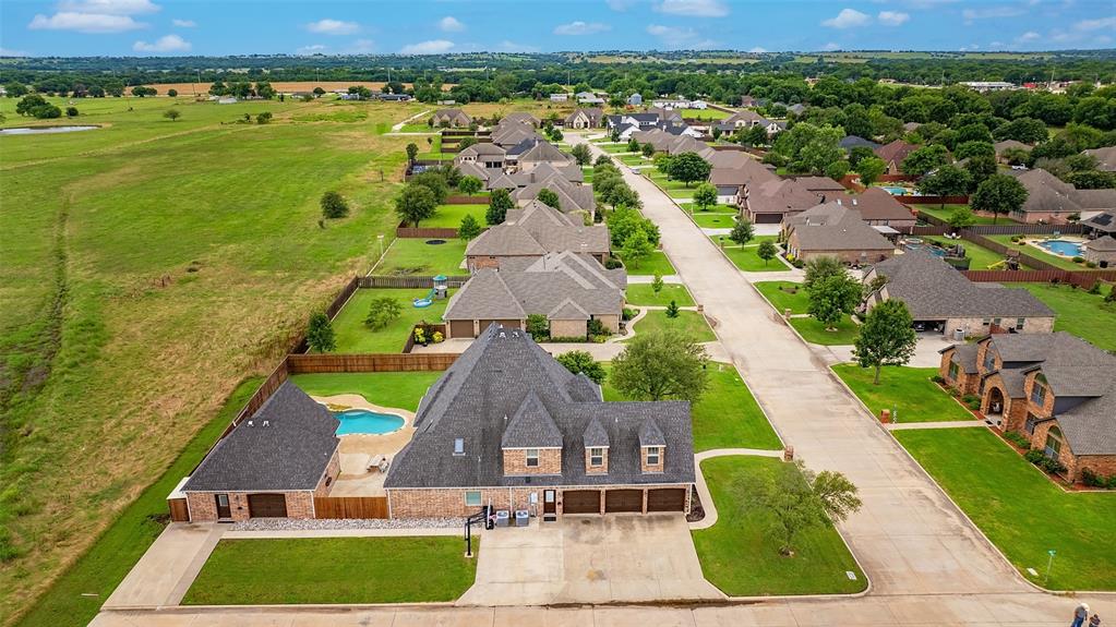 an aerial view of a house with a garden
