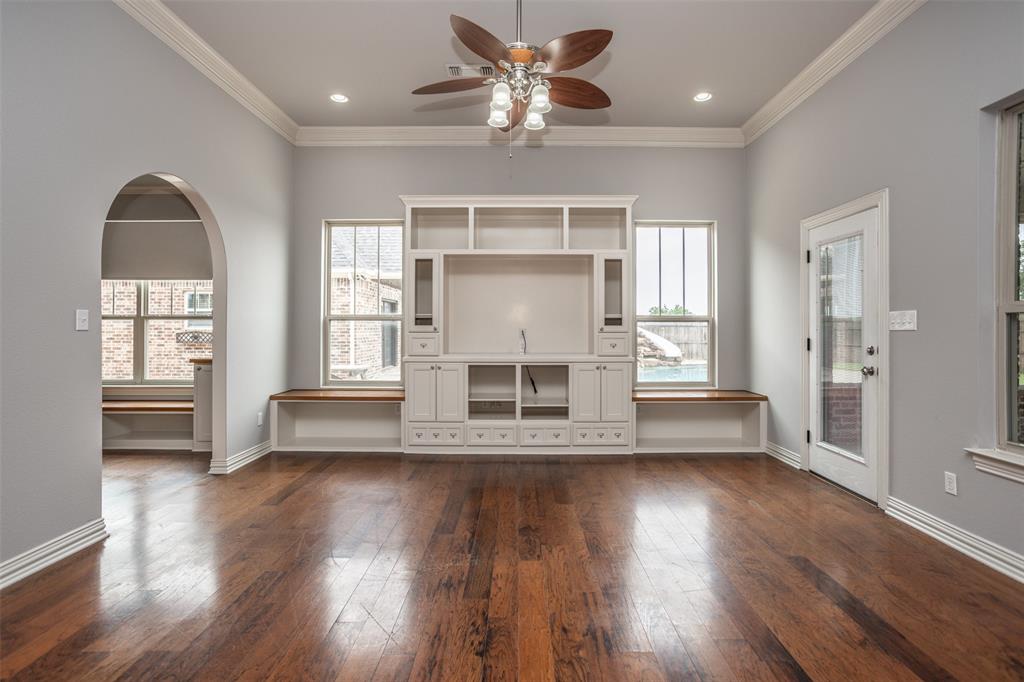 1218 Walter Street Lindsay, TX 76240 - Photo 11 of 40 wooden floor in an empty room with a window