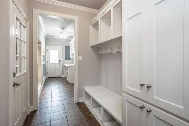 a bathroom with a sink and mirror with toilet