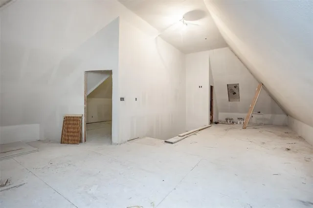a kitchen with sink a refrigerator and cabinets
