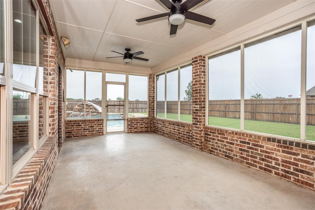 1218 Walter Street Lindsay, TX 76240 - Photo 9 of 40 a view of an empty room and a balcony