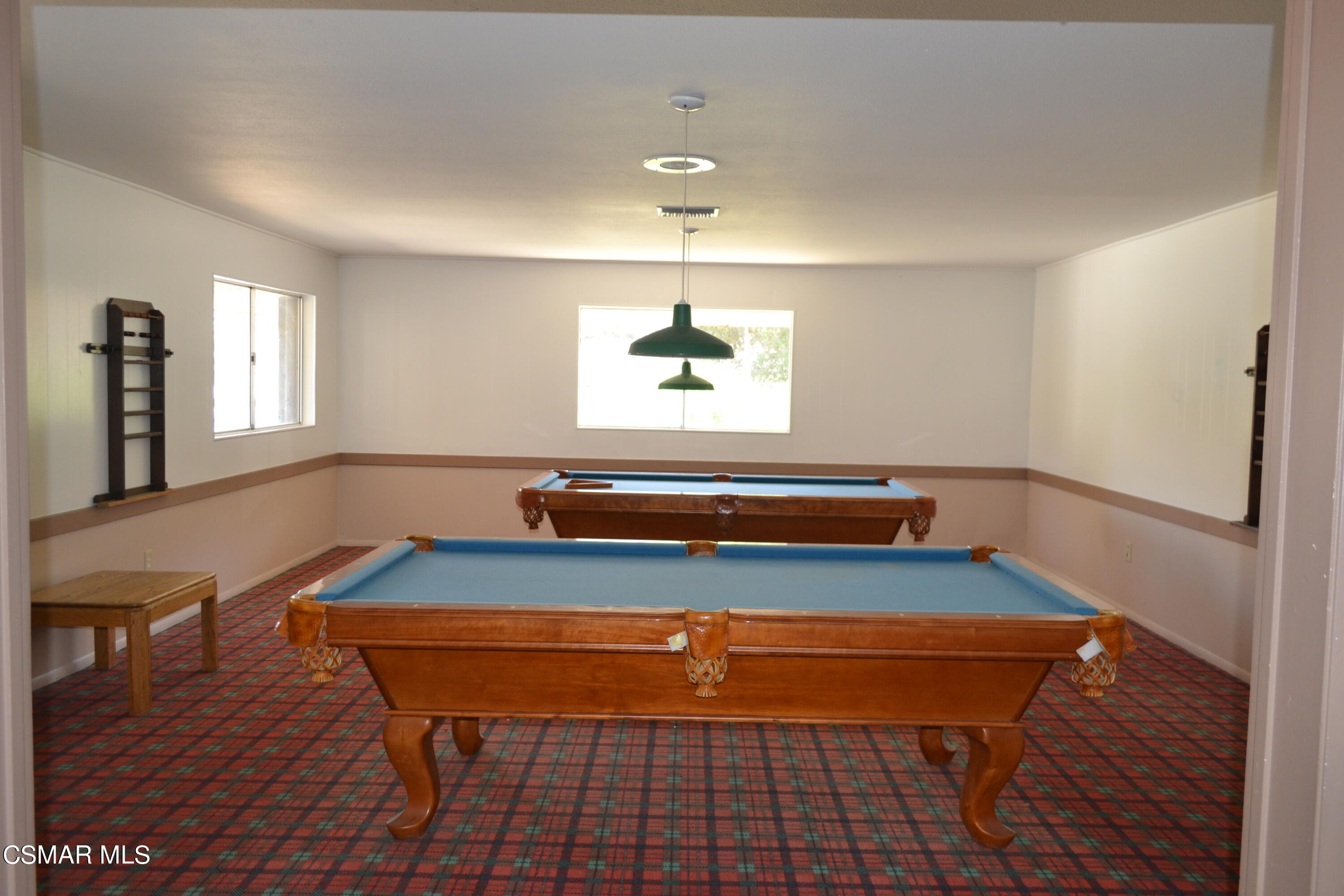 6480 Katherine Road, Unit 70 Simi Valley, CA 93063 - Photo 21 of 28 a room with wooden floor and window