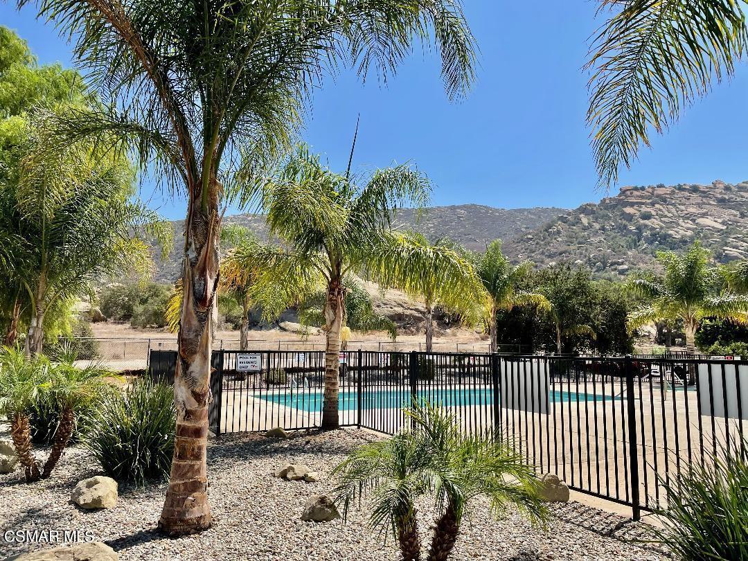 6480 Katherine Road, Unit 70 Simi Valley, CA 93063 - Photo 23 of 28 a view of a wrought iron iron fence